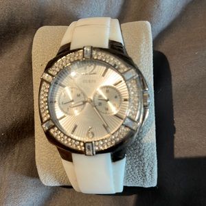 Guess women’s watch with white leather strap